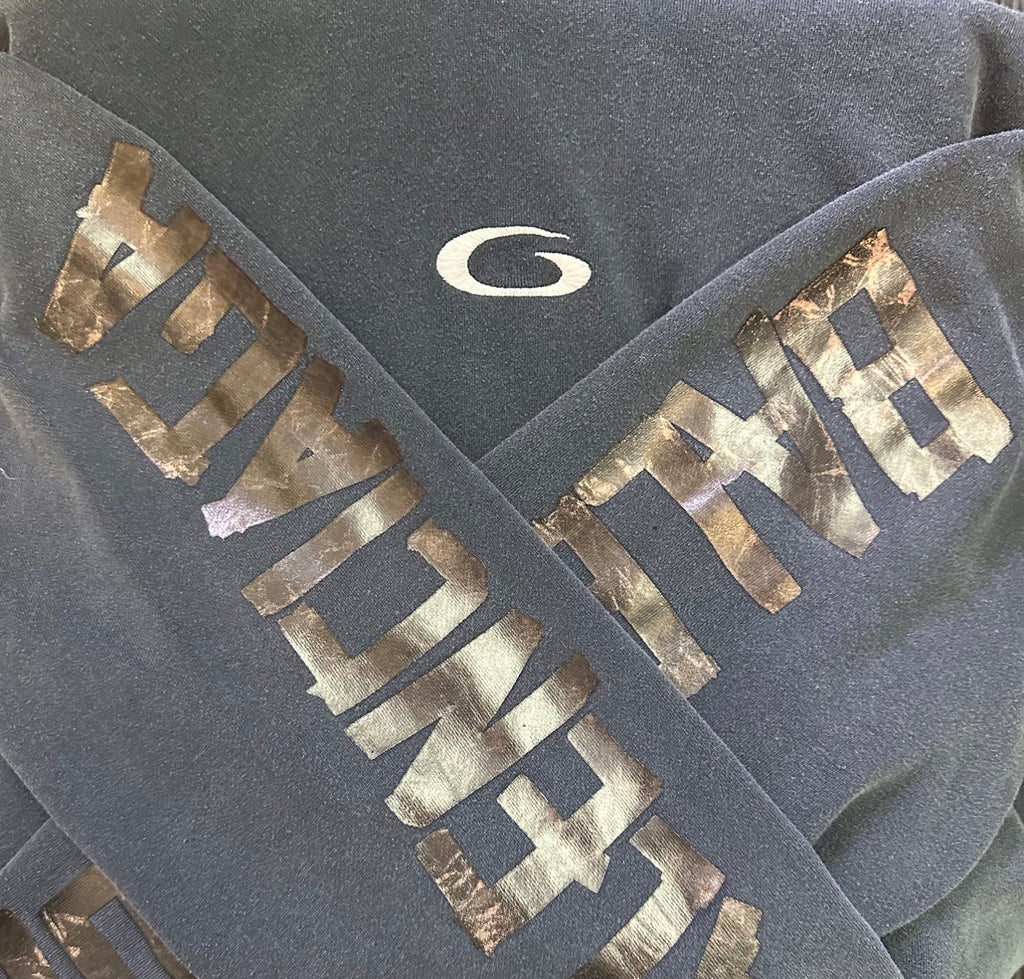 Balenciaga long-sleeve hoodie sleeve print, dark gray fabric with gold lettering graphic