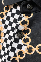 Versace shirt placket close-up with black buttons and gold chain motif on checker print