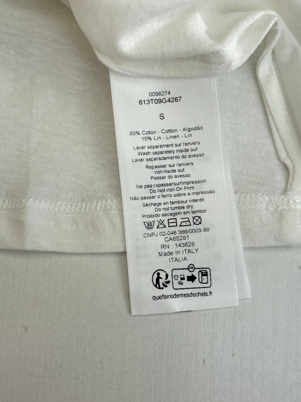 Dior short-sleeve T-shirt size and care label on white fabric