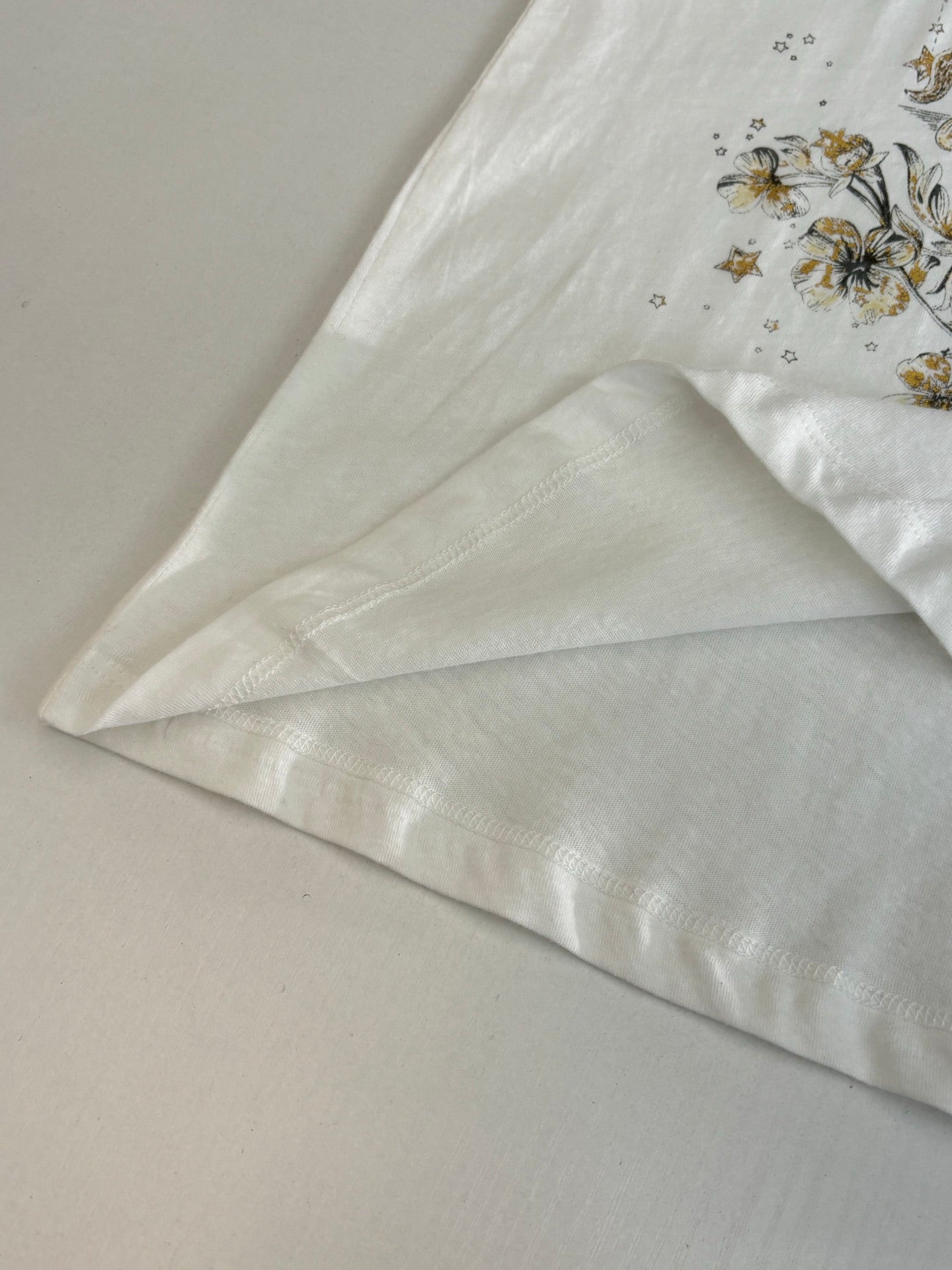 Dior short-sleeve T-shirt, white with sleeve seam and gold floral print detail