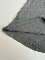 Gray short-sleeve T-shirt sleeve and curved hem detail