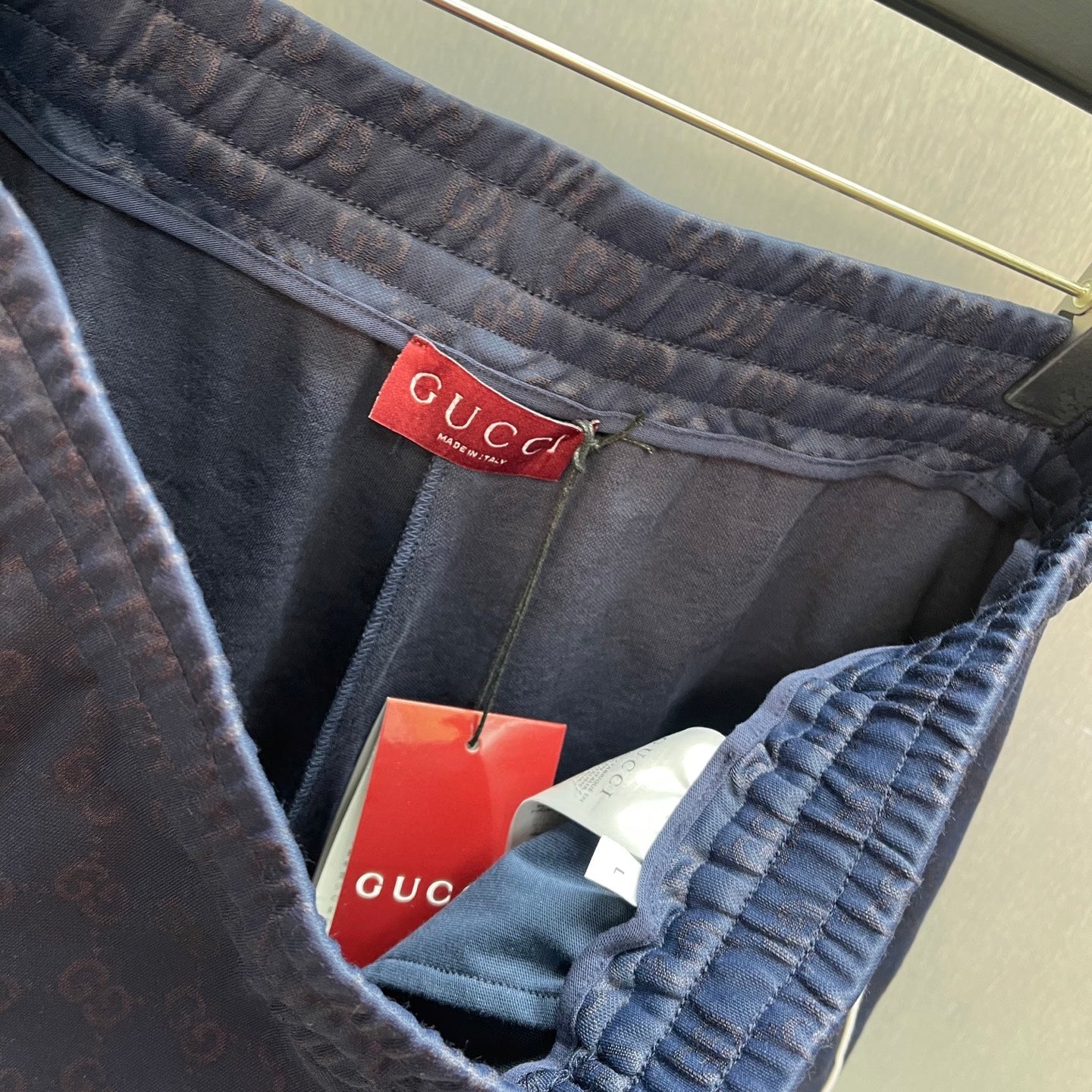 Gucci shorts interior waistband with Gucci label and drawstring cord