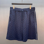 Gucci shorts in dark blue with allover GG logo pattern and elastic waistband