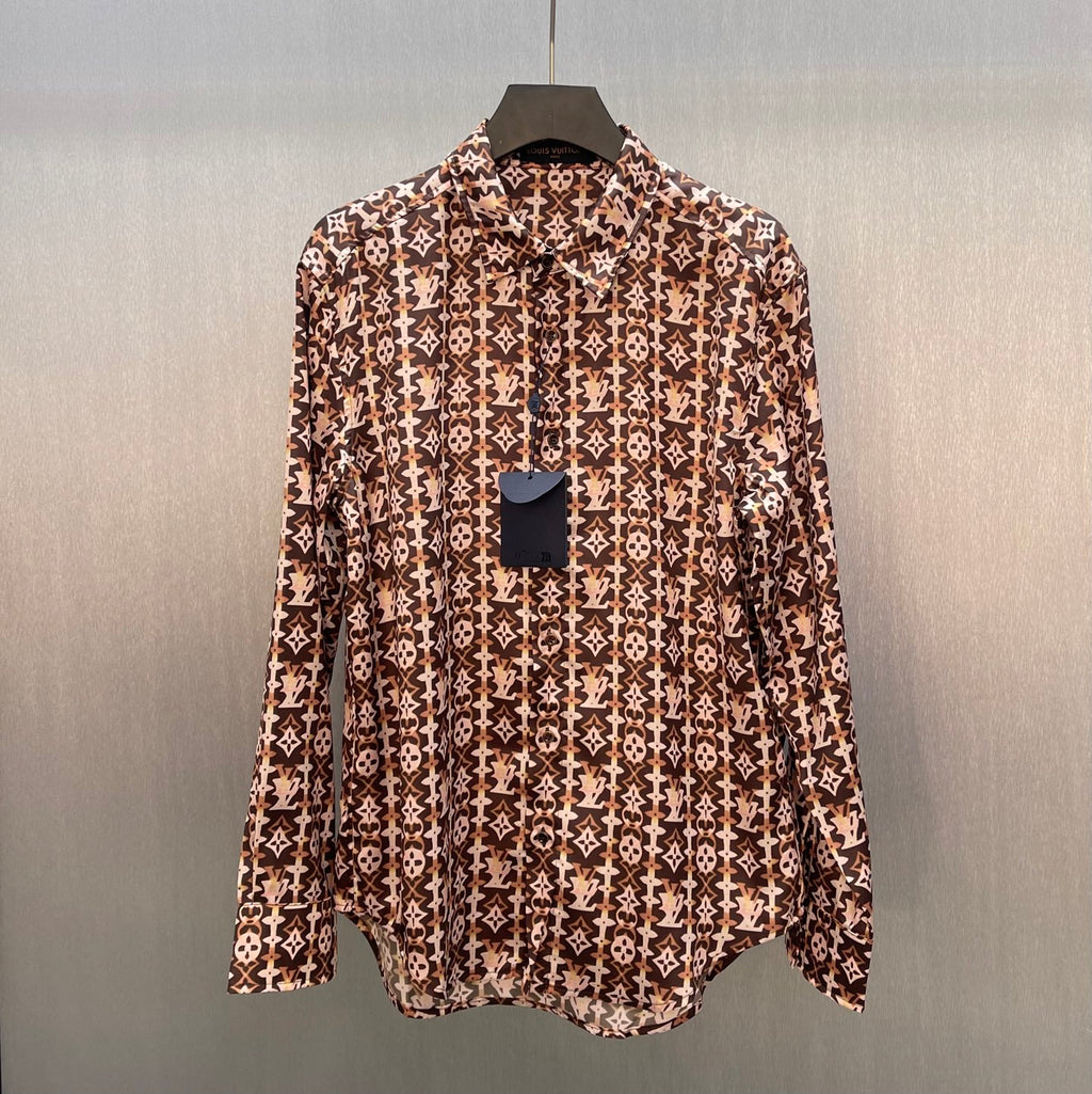 Long-sleeve button-up shirt with brown-and-cream monogram pattern, stand collar