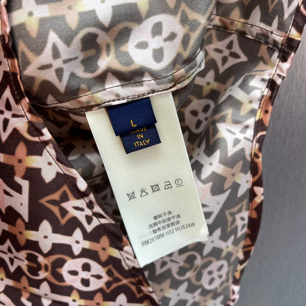 Inside size and origin tag on monogram shirt, 'Made in Italy'