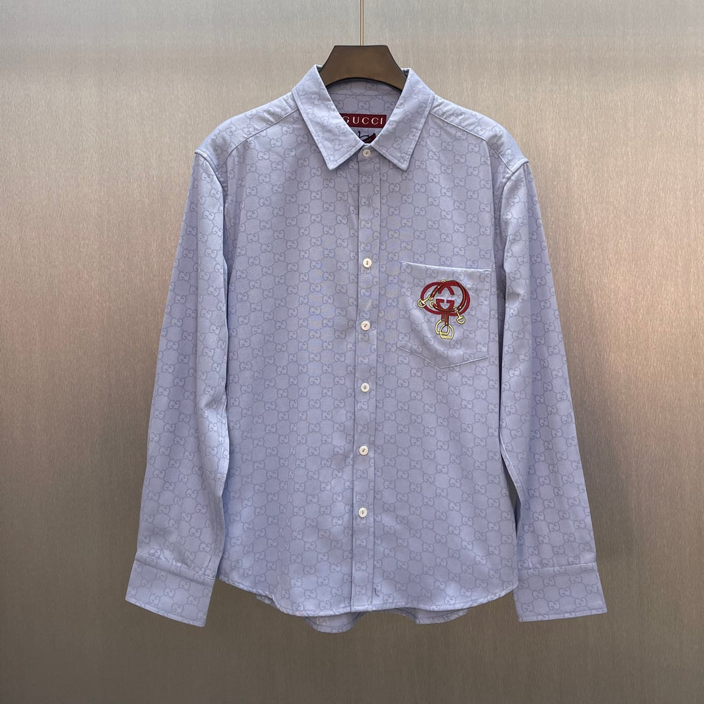 Light blue Gucci long-sleeve shirt with GG pattern, button front, point collar, chest patch