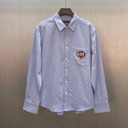 Light blue Gucci long-sleeve shirt with GG pattern, button front, point collar, chest patch