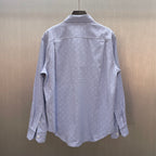 Light blue Gucci long-sleeve shirt back view with GG monogram print and button cuffs
