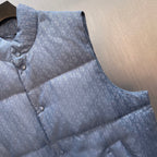 Light blue monogram quilted puffer vest with stand collar and button closure