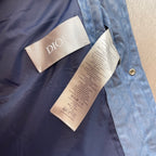 Blue monogram puffer vest interior with Dior label and care tags