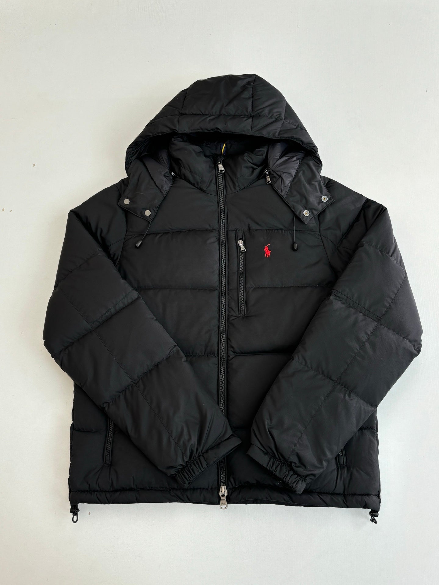 Ralph Lauren black hooded puffer jacket with zip front and red polo logo