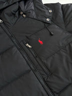 Ralph Lauren black puffer jacket chest details, full-zip and red horse logo
