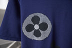 Navy T-shirt with large LV flower graphic on sleeve