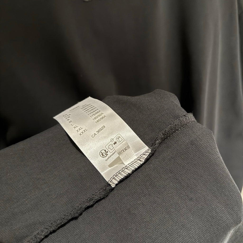 Black Louis Vuitton T-shirt with care label stitched at hem