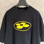 Louis Vuitton short-sleeve T-shirt detail, front yellow face logo