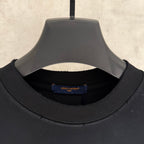 Louis Vuitton T-shirt neckline detail with inner brand label "LOUIS VUITTON" "PARIS"