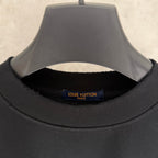 Black T-shirt collar with Louis Vuitton neck label