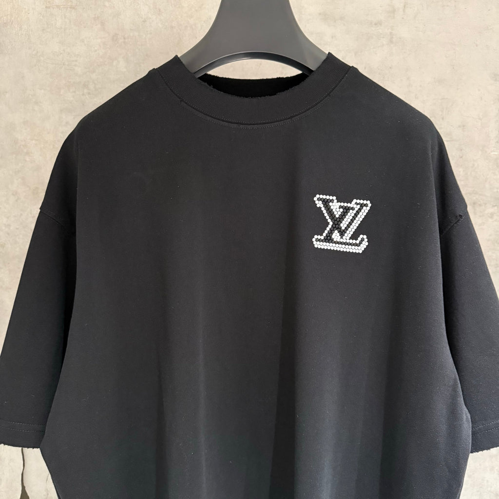 Black T-shirt with rhinestone LV logo patch on upper chest