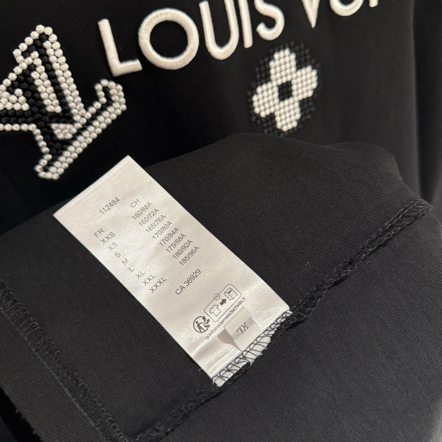 Louis Vuitton black T-shirt sleeve with inside care label