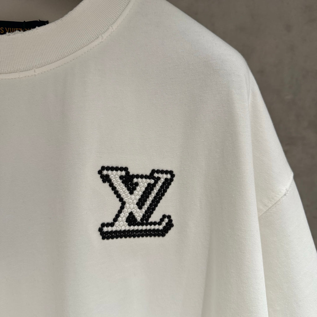 White short-sleeve T-shirt with black LV monogram patch logo on side