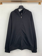 Black zip-up hoodie with hood, front pocket, and metal zipper