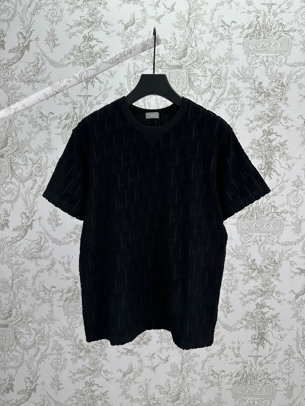 Black Dior crew-neck T-shirt on hanger