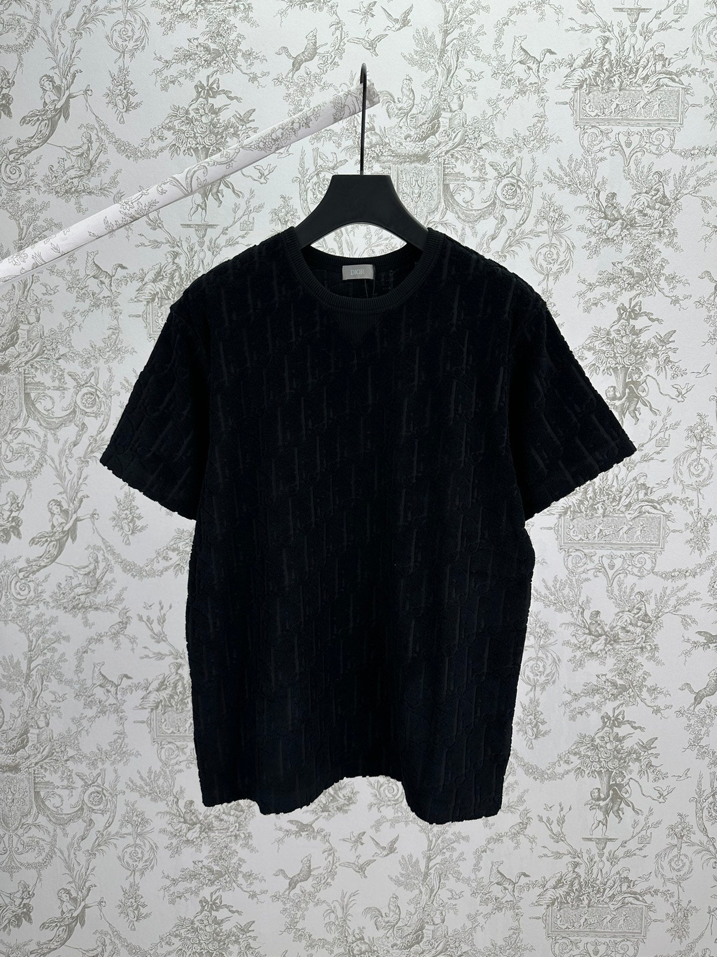 Black Dior crew-neck T-shirt on hanger