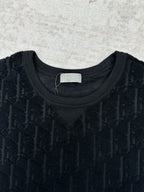 Black Dior crew-neck T-shirt close-up, jacquard pattern