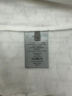 White T-shirt size S care label with 100% cotton content and Made in Italy