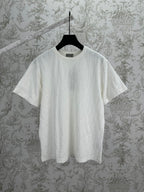 White Dior crewneck T-shirt with short sleeves and subtle embossed texture