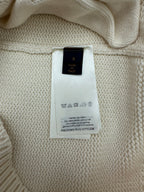 Cream knit cardigan interior care label, made in Italy text