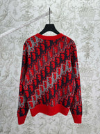 Dior knit sweater in red and dark blue with repeating logo pattern, ribbed hem