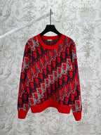 Dior knit sweater in red and dark blue with repeating logo pattern, ribbed crewneck