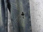 Blue denim jeans pants with a black cross graphic on the thigh