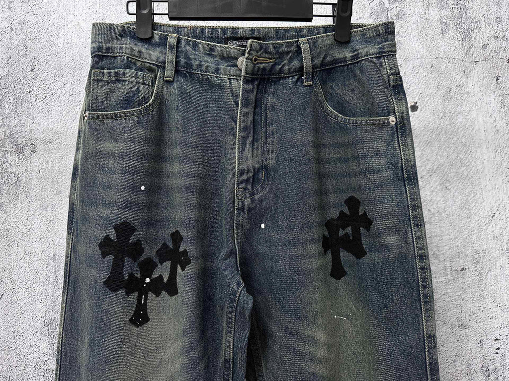 Blue denim jeans pants with black cross graphics on the back legs