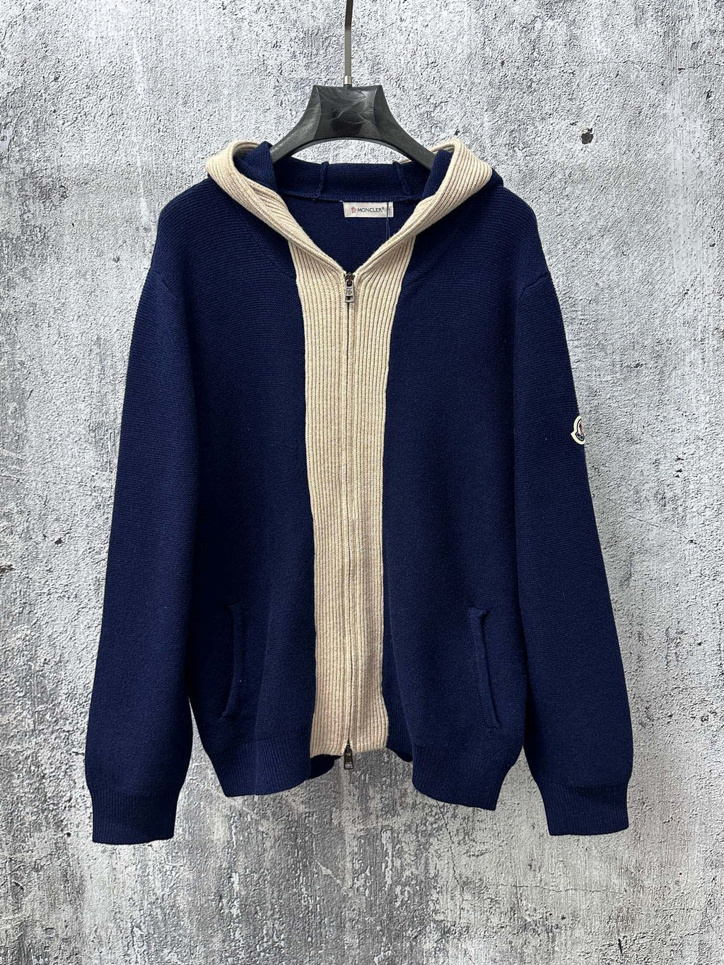 Moncler long navy knit hoodie with cream ribbed hood and front zipper