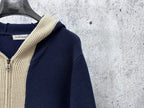 Moncler knit hoodie hood detail with cream ribbed trim and front zipper