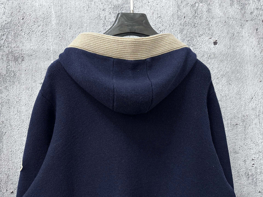 Moncler long navy knit hoodie back view with cream ribbed hood trim