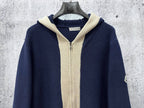 Moncler long navy knit hoodie front view with cream ribbed hood and zipper