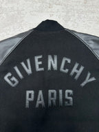 Black bomber jacket with large Givenchy Paris lettering on back