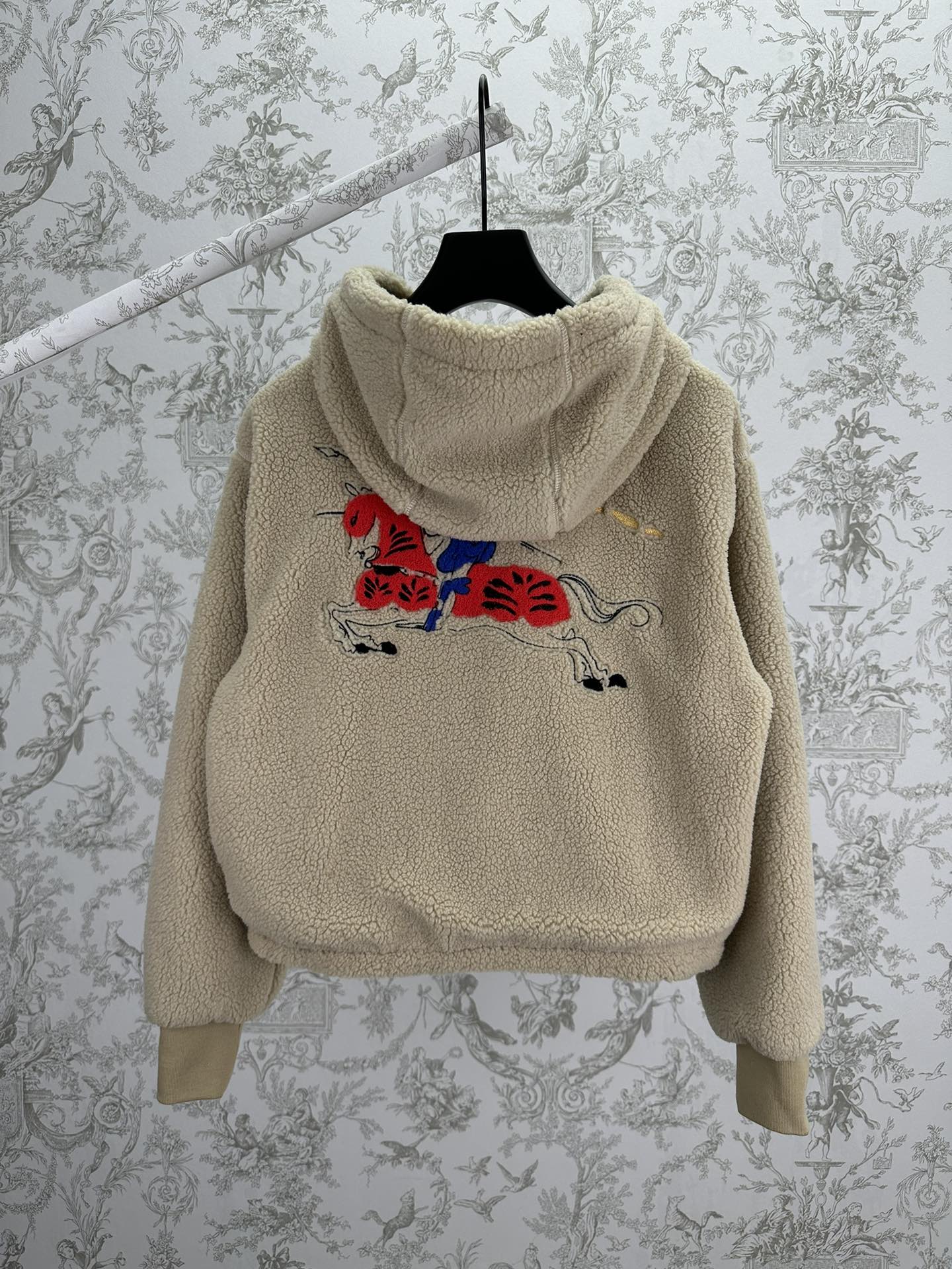 Burberry hooded sherpa jacket, cream fleece with hood and red/blue back graphic embroidery