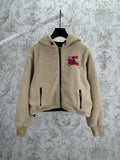 Burberry hooded sherpa jacket, cream fleece with full-zip and colorful chest embroidery