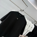 Prada short-sleeve T-shirt, black, chest close-up with small logo