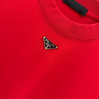 Prada triangular logo detail on red crew-neck T-shirt