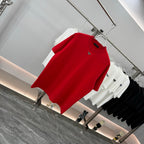 Prada red short-sleeve T-shirt, angled view, crew neck with small triangular logo