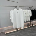White short-sleeve T-shirt with Prada triangular logo and black stripe on chest