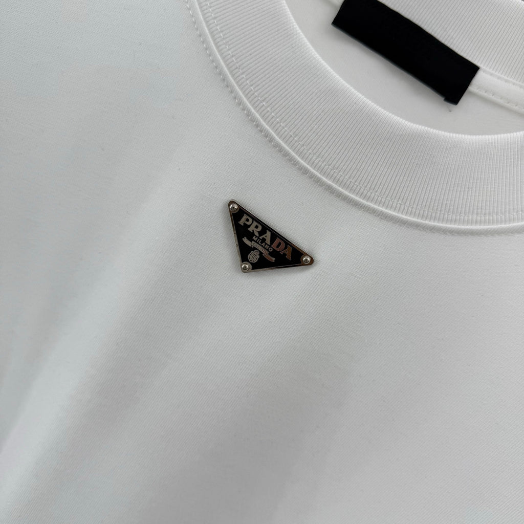 White T-shirt with small Prada triangular logo on the chest