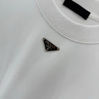 White T-shirt with small Prada triangular logo on the chest