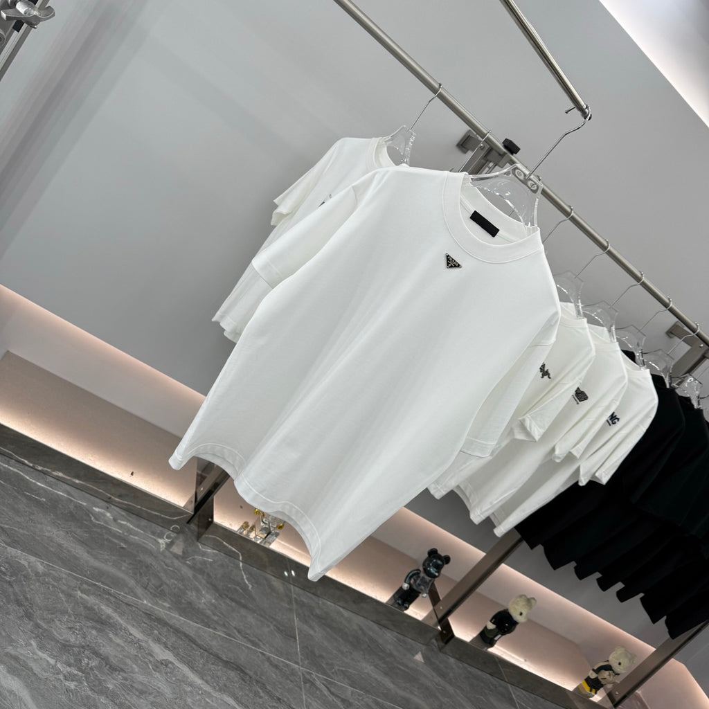 White short-sleeve T-shirt on hanger, triangular Prada badge at chest