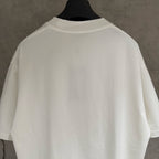 White short-sleeve T-shirt back view with crew neckline and minimal seams